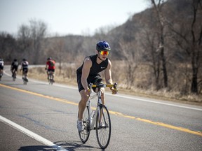 OTTAWA -April 10, 2021 -People got out and enjoyed the extra space to safely cycle on the Sir George-Étienne Cartier parkway Saturday, April 10, 2021. The NCC announced this past week they will be closing multiple parkways in the capital to allow people to safely get out and be active over the weekend.