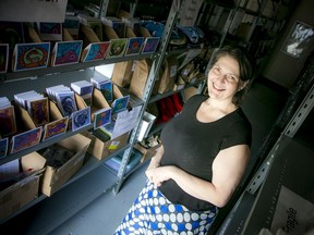 Jennifer Hayward, CEO of Gopher It Deliveries, at her south-end warehouse: For small local businesses to survive, they must help each other.