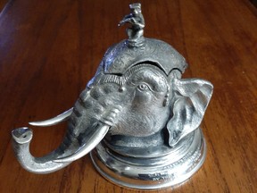 Elephant head inkwell.