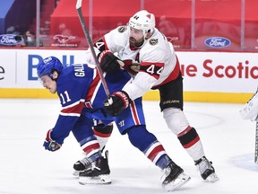 Erik Gudbranson of the Ottawa Senators defends against Brendan Gallagher f the Montreal Canadiens, Feb. 24, 2021.