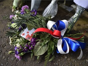 Members of the public gather at Hillsborough Castle and leave tributes to Prince Philip, Duke Of Edinburgh who died at age 99 during the midday 41 gun salute on April 10, 2021 in Hillsborough, United Kingdom.