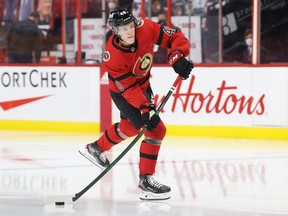 Jacob Bernard-Docker #48 of the Ottawa Senators warms up prior to his NHL debut against the Winnipeg Jets at Canadian Tire Centre on April 14, 2021.