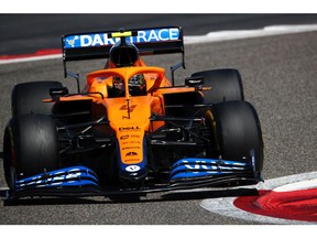 Lando Norris of Great Britain driving the (4) McLaren F1 Team MCL35M Mercedes on track during Day Three of F1 Testing at Bahrain International Circuit on March 14, 2021 in Bahrain.