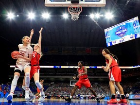 SAN ANTONIO, TEXAS - APRIL 04: Cameron Brink #22 of the Stanford Cardinal drives against Cate Reese #25 of the Arizona Wildcats during the first half in the National Championship game of the 2021 NCAA Women's Basketball Tournament at the Alamodome on April 04, 2021 in San Antonio, Texas.