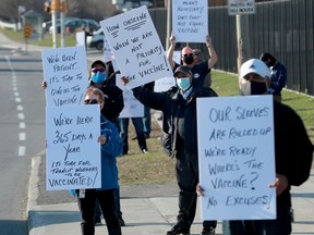 The union representing Ottawa public transit workers held a protest on Friday to call for vaccines for city transit employees. Errol McGihon/Postmedia