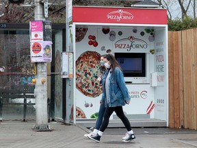 The new PizzaForno vending machine on Bank Street in Old Ottawa South, which delivers a piping hot, fresh pizza in three minutes for approximately $13.