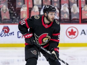 Ottawa Senators defenceman Victor Mete lines up for a face-off Winnipeg Jets, April 12, 2021.