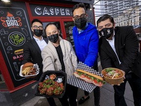 Casper Kitchen Co. partners David Wen, Nara Sok, Sharif Virani, and Ulises Ortega show off a variety of food available from their brands Old's BBQ, Viet Fresh, Banh Mi Bros, and Fried Chicken for the Seoul.