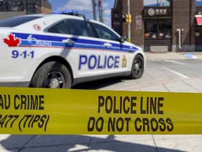 Ottawa police at the scene of a homicide near Somerset Street and Arthur Street. Friday, Apr. 23, 2021