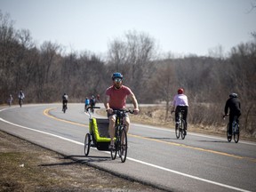 People got out and enjoyed the extra space to safely cycle on the Sir George-Étienne Cartier parkway Saturday, April 10, 2021.