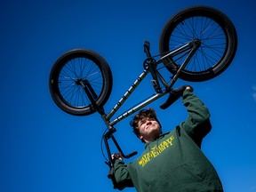 Thirteen-year-old Chase Tubman with his new BMX bike. Tubman turned a bad event into something positive after he had a run-in with a young man who stole his hard-earned money. His father made a post on social media to raise awareness of the troublemaker in the community, and an outpouring of support came in.