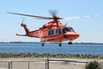 An Ornge helicopter air ambulance takes off from the helicopter pad at the Kingston Health Sciences Centre.