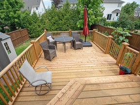 A backyard deck increases your living space in the summer months and can also make your house seem larger.