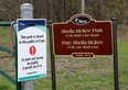 A sign at Sheila McKee Park in Dunrobin  advising of a 9 p.m. closing time. TONY CALDWELL/Postmedia