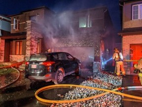 Ottawa Fire Services crews on the scene of a two-alarm fire on Aquarium Avenue in Orléans on Thursday night.