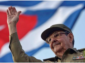 FILE PHOTO: Cuba's President Raul Castro waves to the crowd during the May Day parade at Havana's Revolution Square May 1, 2008.