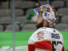 Florida Panthers goaltender Chris Driedger checks the replay screen during the second period against the Dallas Stars at the American Airlines Center.