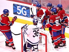 Montreal Canadiens right wing Josh Anderson (17) celebrates his goal against Toronto Maple Leafs goaltender Jack Campbell (36) with teammates during the second period at Bell Centre on Monday, April 12, 2021.