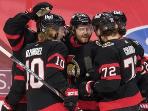 Ottawa Senators center Chris Tierney (71) celebrates with team his goal scored in the second period against the Vancouver Canucks at the Canadian Tire Centre.