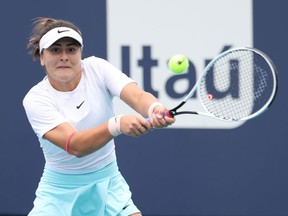 Bianca Andreescu of Canada hits a backhand against Ashleigh Barty of Australia (not pictured) in the women's singles final in the Miami Open at Hard Rock Stadium, April 3, 2021.
