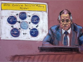 Minneapolis Police Department Sgt. Ker Yang answers questions as a police training chart is shown on the seventh day of the trial of former Minneapolis police officer Derek Chauvin for second-degree murder, third-degree murder and second-degree manslaughter in the death of George Floyd in Minneapolis, Minnesota, U.S. April 6, 2021 in this courtroom sketch.
