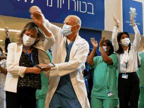 That's the spirit! Healthcare workers in Israel do a celebratory dance before getting their COVID-19 vaccine shots. In Canada, getting the COVID vaccine only gets you a grim admonition to stay the hell home.