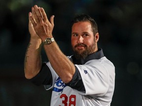 Éric Gagné played Major League Baseball for 10 years, eight of them with the Los Angeles Dodgers. He won the National League's Cy Young Award, given to a league's top pitcher, in 2003.