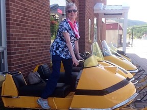 Carmelita Aubert, then 87, poses with a Ski-Doo on Canada Day two years ago.