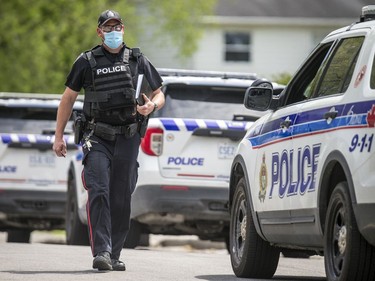 Ottawa police had numerous officers from multiple units at a housing complex on Hochelaga Street, Sunday, May 16, 2021.