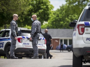 Ottawa police had numerous officers from multiple units at a housing complex on Hochelaga Street, Sunday, May 16, 2021.