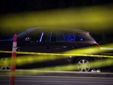 Ottawa police were on the scene of a shooting that took place Sunday evening. Another part of the investigation was taking place at the intersection of Woodroffe Ave. and Baseline Road where a vehicle was taped off, shoes and clothing were laying on the ground beside the car, Sunday.