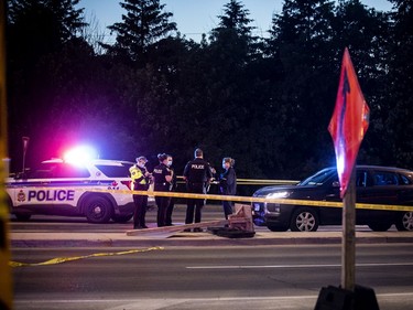 Ottawa police were on the scene of a shooting that took place Sunday evening. Another part of the investigation was taking place at the intersection of Woodroffe Ave. and Baseline Road where a vehicle was taped off, shoes and clothing were laying on the ground beside the car.