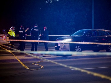 Ottawa police were on the scene of a shooting Sunday evening. Another part of the investigation was taking place at the intersection of Woodroffe Ave. and Baseline Road where a vehicle was taped off, Sunday, May 30, 2021.