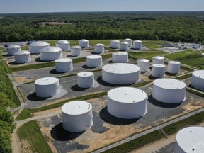 In an aerial view, fuel holding tanks are seen at Colonial Pipeline's Dorsey Junction Station on May 13, 2021 in Washington, DC. The Colonial Pipeline has returned to operations following a cyberattack that disrupted gas supply for the eastern U.S. for days.