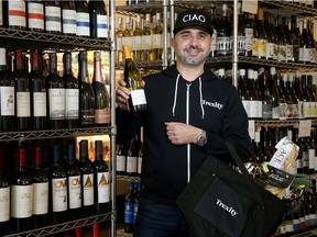 Co-owner of Bottega Nicastro, Pat Nicastro, stands in the wine section of his salad restaurant, Lollo, in the Byward Market.