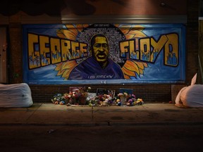 Offerings are left at George Floyd Square in Minneapolis, Minnesota, on May 21, 2021.