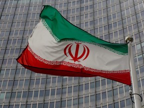 An Iranian flag flutters in front of the International Atomic Energy Agency (IAEA) headquarters in Vienna, Austria, in 2019.