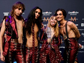 Maneskin of Italy pose with the trophy following a news conference after winning the 2021 Eurovision Song Contest, in Rotterdam, Netherlands, May 23, 2021.