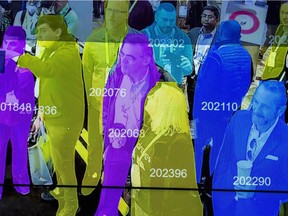 (FILES) In this file photo taken on January 10, 2019 a live demonstration uses artificial intelligence and facial recognition in dense crowd spatial-temporal technology at the Horizon Robotics exhibit at the Las Vegas Convention Center