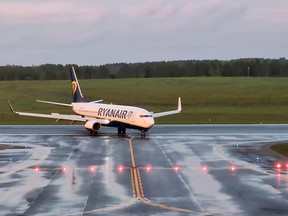 A Ryanair aircraft, which was carrying Belarusian opposition blogger and activist Roman Protasevich and diverted to Belarus, where authorities detained him, lands at Vilnius Airport in Vilnius, Lithuania May 23, 2021.