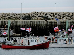 Fishing boats from the Sipekne'katik band, part of the First Nations Mi'kmaw community, who began harvesting lobster outside of the commercial season due to a 1999 Supreme Court of Canada ruling, are seen tied up in Saulnierville, Nova Scotia, Canada September 22, 2020.