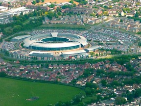 CESG (originally Communications-Electronics Security Group) is the branch of GCHQ which works to secure the communications and information systems of the government and critical parts of UK national infrastructure. Shown in this photo  is GCHQ from just East of Cheltenham. Credit: Bthebest/Wikipedia Commons