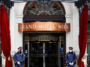 FILE PHOTO: Police stand outside a hotel where a meeting of the Joint Commission of the Joint Comprehensive Plan of Action (JCPOA), or Iran nuclear deal, is held in Vienna, Austria, April 20, 2021. REUTERS/Leonhard Foeger/File Photo