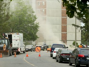 Crews work at the site of a gas leak on Paul Anka Drive on Thursday, May 20, 2021.