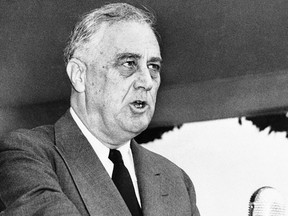 In this 1943 photo, U.S. President Franklin Delano Roosevelt speaks in Washington. His crisis was the Depression; Joe Biden's first challenge has been COVID-19.