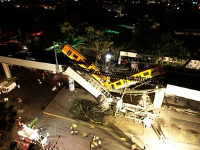 A general view of damage caused after a railway overpass and train collapsed onto a busy road in this drone picture obtained from social media Mexico City, Mexico May 4, 2021.