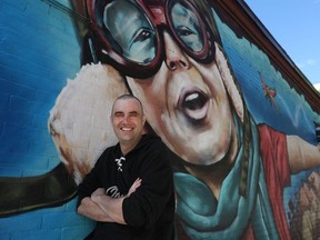 Chris Hofley poses for a photo near Second Ave in Ottawa Thursday. Hofley shaved his head and helped raise money for a CHEO fundraiser he organized.