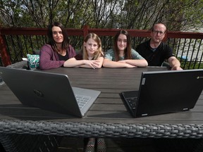 Nadine LeBlanc, her daughters Lila, 10, and Gabby, 13, and her husband Jason have been balancing remote learning with work since April.