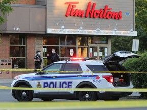 File: Ottawa police on the scene of the multiple shootings in Alta Vista last May.