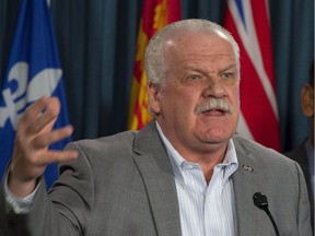 Files:  PSAC President Chris Aylward speaks duding a 2018 news conference in Ottawa
